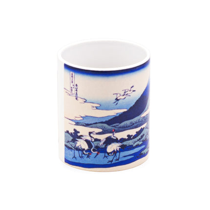 Japanese Blue Ceramic Cup with Mountain, Crane, and Cloud Designs